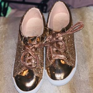 Rose gold tennis shoes